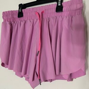 Pink flowy athletic shorts